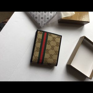 Gucci waxed leather GG monogram Bi-fold wallet
